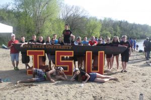 ISU ASCE Concrete Canoe team poses with concrete canoe