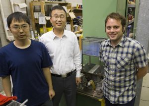 (From left) Postdoctoral student Hao Wu, Asst. Professor An Chen and Assoc. Professor Simon Laflamme with scale model of TLWD