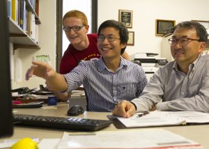 Jeong (right) and student researchers Tuyen Le (center) and Alan Hayes (Photo by Kate Tindall)