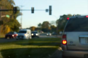 Cars at a stoplight intersection